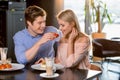 Romantic couple in love having lunch together in restaurant Royalty Free Stock Photo