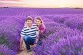 Romantic couple in love in lavender fields in Royalty Free Stock Photo