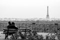 Romantic couple in love looking at Eiffel Tower