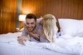 Romantic couple in love lying in bed together Royalty Free Stock Photo