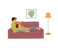 Romantic couple in love relaxing on the couch at home Royalty Free Stock Photo