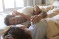 Romantic Couple Lying In Bed Together Royalty Free Stock Photo