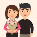 Romantic couple man and woman. Girl holding a bouquet of flowers in his hands. The boyfriend hugs his girlfriend. Cute
