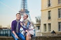 Romantic couple near the Eiffel tower in Paris, France Royalty Free Stock Photo