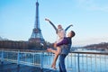 Romantic couple near the Eiffel tower in Paris, France Royalty Free Stock Photo