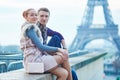 Romantic couple near the Eiffel tower in Paris, France Royalty Free Stock Photo