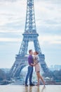 Romantic couple near the Eiffel tower in Paris, France Royalty Free Stock Photo