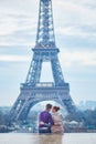 Romantic couple near the Eiffel tower in Paris, France Royalty Free Stock Photo