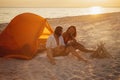 Romantic Couple Near a Tent on the Beach Royalty Free Stock Photo