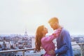 Romantic couple in Paris, happy moment on Eiffel Tower background