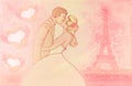 Romantic couple in Paris kissing near the Eiffel Tower. Royalty Free Stock Photo