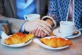 Romantic couple in Parisian cafe Royalty Free Stock Photo