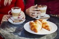 Romantic couple in Parisian outdoor cafe Royalty Free Stock Photo