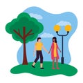 romantic couple in the park with lamp post and tree Royalty Free Stock Photo