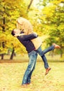 Romantic couple playing in the autumn park Royalty Free Stock Photo