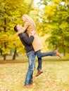 Romantic couple playing in the autumn park Royalty Free Stock Photo