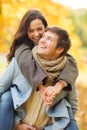 Romantic couple playing in the autumn park Royalty Free Stock Photo