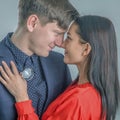 Romantic couple. Portrait of attractive brunette girl and guy hugging each other. Concept of tenderness and love Royalty Free Stock Photo