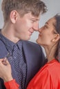 Romantic couple. Portrait of attractive brunette girl and guy hugging each other. Concept of tenderness and love. Vertical image Royalty Free Stock Photo