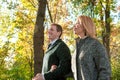 Romantic couple relaxing in autumn park, cuddling, kissing, enjoying fresh air, beautiful nature, nice fall weather Royalty Free Stock Photo