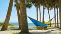 Romantic couple relaxing in tropical hammock Royalty Free Stock Photo