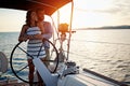 Romantic couple sailing on the luxury boat together and enjoy at sunset Royalty Free Stock Photo