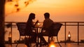 romantic couple sit in restaurant at night sunset sea beach Royalty Free Stock Photo