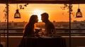 romantic couple sit in restaurant at sunset sea Royalty Free Stock Photo