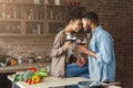 Romantic couple toasting each other with glasses of red wine Royalty Free Stock Photo