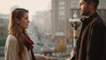 Romantic couple touching hands outdoors. Closeup man and woman hands crossing.