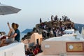 Romantic couple tourists taking selfie photo in Santorini sunset point Greece. Wish list for year 2021