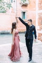 Romantic couple in Venice dancing and happy together. Italy, Europe. Royalty Free Stock Photo