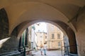 Romantic couple on a walk in France, summer honeymoon in europe with young family on a trip in old town, walking in old alley way Royalty Free Stock Photo