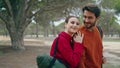 Romantic couple walking autumn forest holding hands close up. Hikers strolling Royalty Free Stock Photo