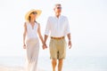 Romantic Couple Walking on the Beach Royalty Free Stock Photo