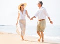 Romantic Couple Walking on the Beach Royalty Free Stock Photo