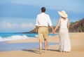 Romantic Couple Walking on the Beach Royalty Free Stock Photo