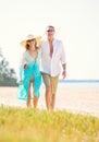 Romantic Couple Walking on the Beach Royalty Free Stock Photo