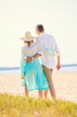 Romantic Couple Walking on the Beach Royalty Free Stock Photo