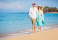 Romantic Couple Walking on the Beach Royalty Free Stock Photo