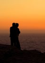 Romantic couple watching sunset