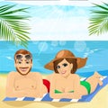 Romantic couple wearing swimsuit lying together on towel at the beach