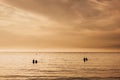 Romantic couples watching sea sunset