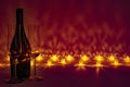 Romantic cozy evening with empty glasses and bottle of champagne Royalty Free Stock Photo