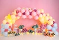 Romantic decoration personalized enchanted garden, with flowers, plants, lights for the first birthday