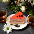 Romantic dessert. Slice of red cake on saucer, Two cups of tea and bouquet of flowers on table. Top side view. Soft Royalty Free Stock Photo