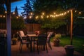 romantic, dimly lit backyard festooned with string lights Royalty Free Stock Photo