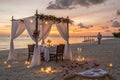 Romantic dinner on the beach with candles Royalty Free Stock Photo