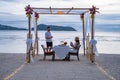 Romantic dinner on the beach, couple man and woman mid age having a romantic dinner on the beach in Phuket Thailand Royalty Free Stock Photo