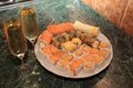 A romantic dinner , champagne glasses and sushi Royalty Free Stock Photo